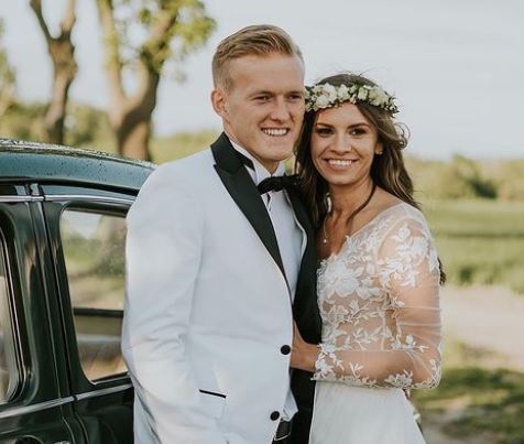 Martyna Swiderska with her husband Karol Swiderski on their wedding day.